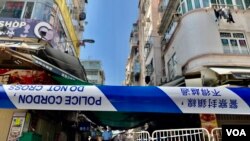 香港政府1月23日新冠肺炎疫情爆發一週年當天,首次在九龍鬧市佐敦及油麻地實施封鎖社區禁足令。(美國之音 湯惠芸拍攝)