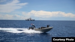 资料照片:美军领导的2013年东南亚合作训练(SEACAT)海上联演在南中国海操演( 2013年9月7日,美国军方照片)