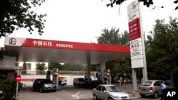 Piles of mannequin limbs are seen outside the Russia's embassy in London as part of a protest against military action in Syria.