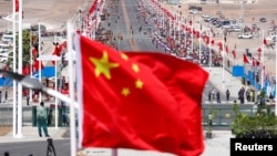 资料照片:中国在巴布亚新几内亚举行一个中国援建项目竣工仪式(2018年11月16日)