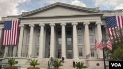 资料照片:位于白宫旁边的美国财政部。(2025年7月26日)