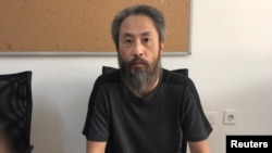 日本记者安田纯平在土耳其哈塔伊省的警察总部。(2018年10月24日)