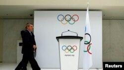 资料图片:2014年7月7日,国际奥委会(IOC)主席托马斯∙巴赫(Thomas Bach)在位于瑞士洛桑的奥委会总部宣布2022年冬奥会候选城市。