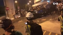 香港警察武力驱逐撤离后又返回的示威者 香港警察武力驱逐撤离后又返回的示威者