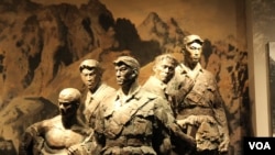 U.S President Donald Trump, accompanied by his wife Melania and Britain's Prince Andrew, second left, places a wreath on the Grave of the Unknown Warrior during a tour of Westminster Abbey in central London, June 3, 2019.