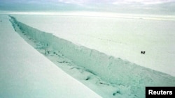 A woman cries as she watches police arrest Black Lives Matter demonstrators on the Brooklyn Bridge near the self-declared &quot;City Hall Autonomous Zone&quot; in New York City,