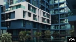 资料照片:泰国芭提雅针对中国投资者销售的海景房,一室一厅一卫带阳台,售价约58万元人民币。(美国之音朱诺拍摄,2015年10月18日)