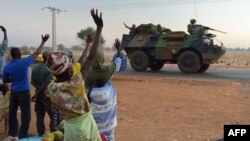 People mourn translator Andrei Mironov, 60, who was killed along with Italian photographer Andrea Rocchelli during fighting in eastern Ukraine, at a memorial service in Moscow.  One of the last political prisoners to be held during the Soviet era, Mironov dedicated the rest of his life to exposing human rights abuses.