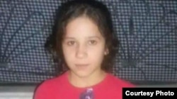 资料照片:被伊斯兰国绑架的伊拉克公民法齐亚·阿明·萨伊多。(2014年被绑架前)