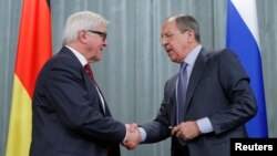 Ngoại trưởng Nga Sergei Lavrov trong một cuộc họp báo chung với Ngoại trưởng Ðức Frank-Walter Steinmeier tại Moscow, ngày 14/2/2014.