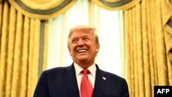 Président Donald Trump na milulu na Maison Blanche, Washington, D.C., 3 décembre 2020.