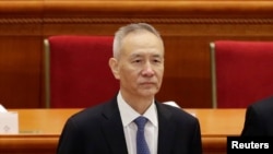 刘鹤2018年3月5日出席全国人大开幕式(路透社)