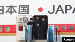 安倍2018年2月9日抵达韩国访问(路透社)