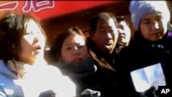 外地访民除夕日在北京王府井乞讨,吁无家可归现状受关注