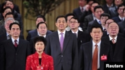 薄熙来(中)、王立军等重庆官员(资料照片)