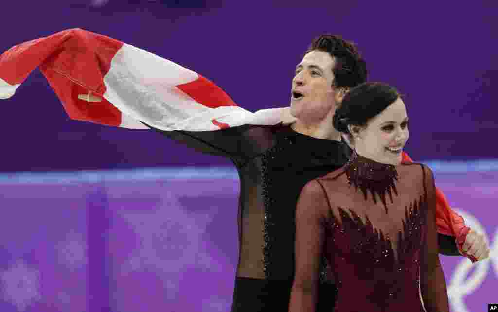 2018年冬季奥运会上,加拿大选手沃尔图和莫伊尔(Tessa Virtue和Scott Moir)2月20日在韩国江陵获得冰舞自由舞滑冰金牌。(2018年2月20日)
