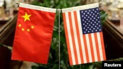 美国财政部长姆努钦和贸易代表莱特希泽美国东部时间12月10日下午与中国国务院副总理通过电话讨论下一步美中贸易谈判