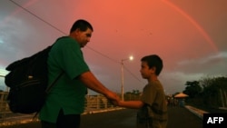 进入墨西哥将要向美国行进的移民大军中的洪都拉斯移民。(2018年10月21日)