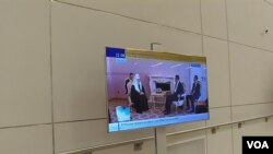 俄罗斯官方电视台5月8日晚间播放的当天习近平与基里尔会晤新闻画面。(美国之音白桦拍摄)