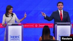 美国共和党总统参选人2023年12月6日举行2023年最后一回合党内辩论。佛罗里达州州长罗恩·德桑蒂斯(Ron DeSantis, 右)与前美国驻联合国大使妮基·黑利(Nikki Haley)唇枪舌剑激烈辩论。(路透社)